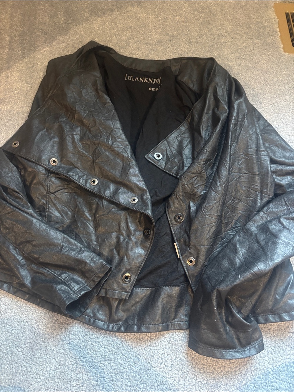 Blank NYC Black Faux Leather Moto Jacket with Grommet Details